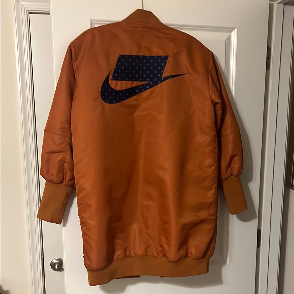 Nike Orange Bomber Jacket with Ribbed Cuffs and Collar